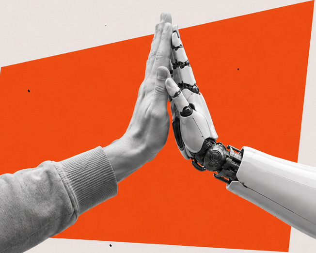 A human hand is high fiving a robot hand.